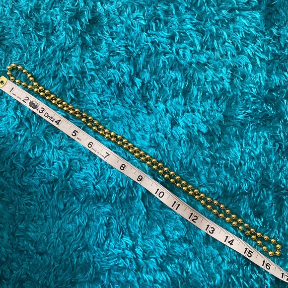 Golden plastic spherical beads necklace (slightly longer) - Picture 6 of 6